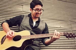 Joyful Guitar Guy Ministry Stock Image