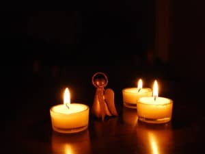 Angel in the Midst of Lit Candles