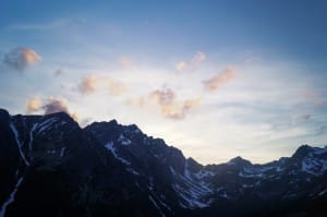 Light Peering Over the Mountains Ministry Stock Photo