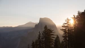 Sunrise Behind the Mountains Religious Stock Photo