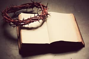 Crown and Bible Religious Stock Image