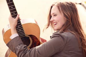 Guitar Girl in Praise Religious Stock Image