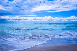 Blue Skies and Ocean Waves Religious Stock Photo