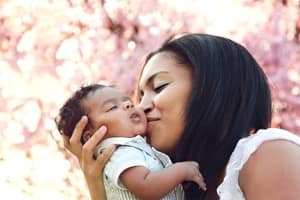 Mother Kissing Baby Stock Images Christian