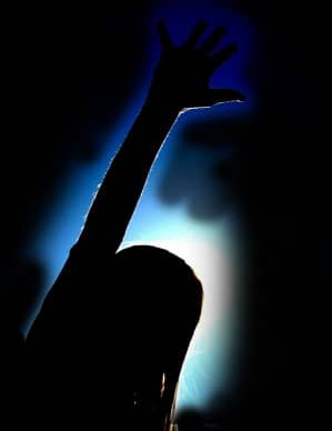 Female Praiser with Black Background