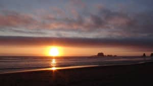 Setting Sun Over Calm Waters Church Stock Photo