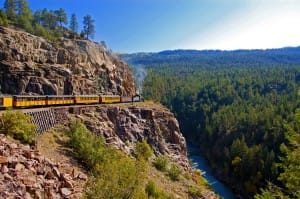 Train Climbing Mountain Side Religious Stock Photo