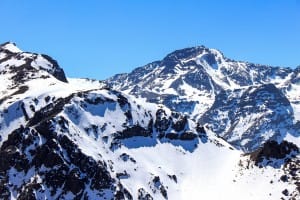 Snow on the Mountain Peaks Religious Stock Photo