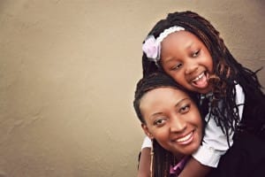 Daughter and Mother Hugging Religious Stock Photos