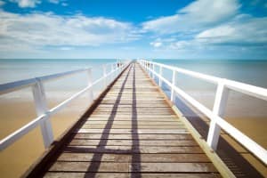 Jetty Walkway on the Beach Ministry Stock Photo
