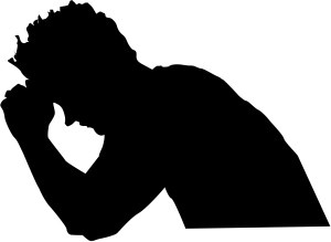 Praying with Head Leaning on Pews