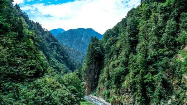 River Through Mountains Landscape Christian Stock Photo